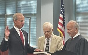 Donald van der Vaart being sworn in as head of OAH